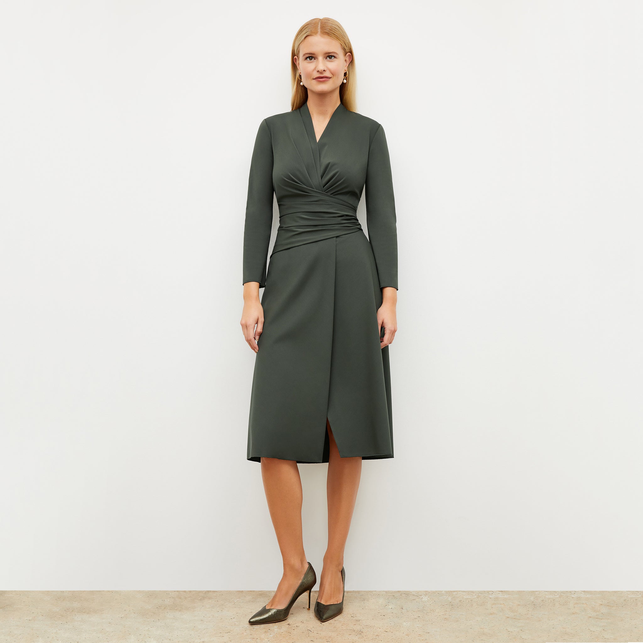 Image of a woman wearing the Carly Dress in Dark Aloe 