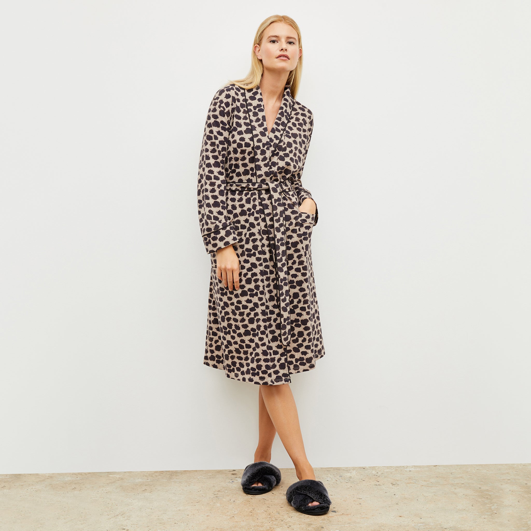 Front image of a woman wearing the Petite Plume x M.M. Luxe Pima Robe in Sahara Print 
