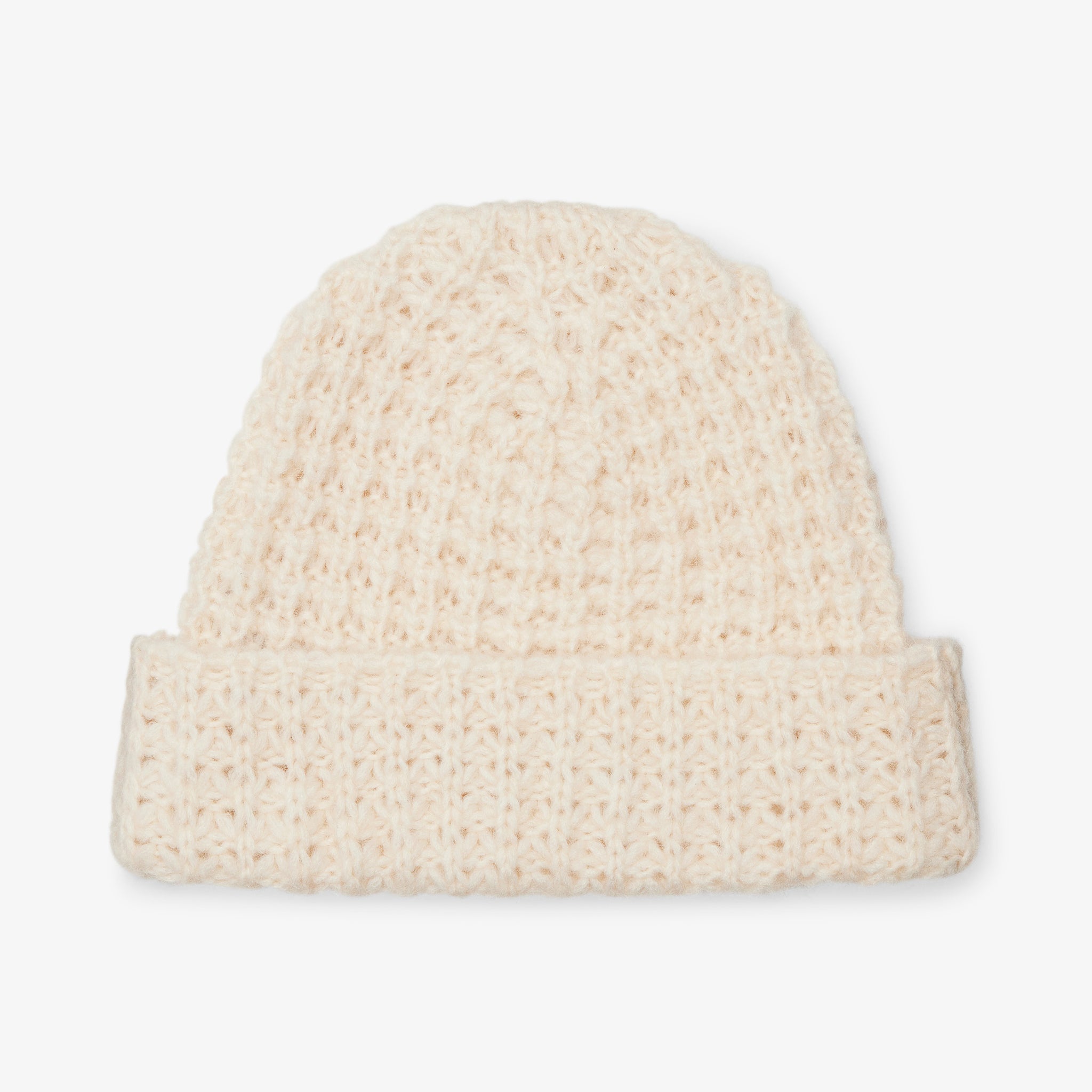 Packshot image of the beanie in ivory 