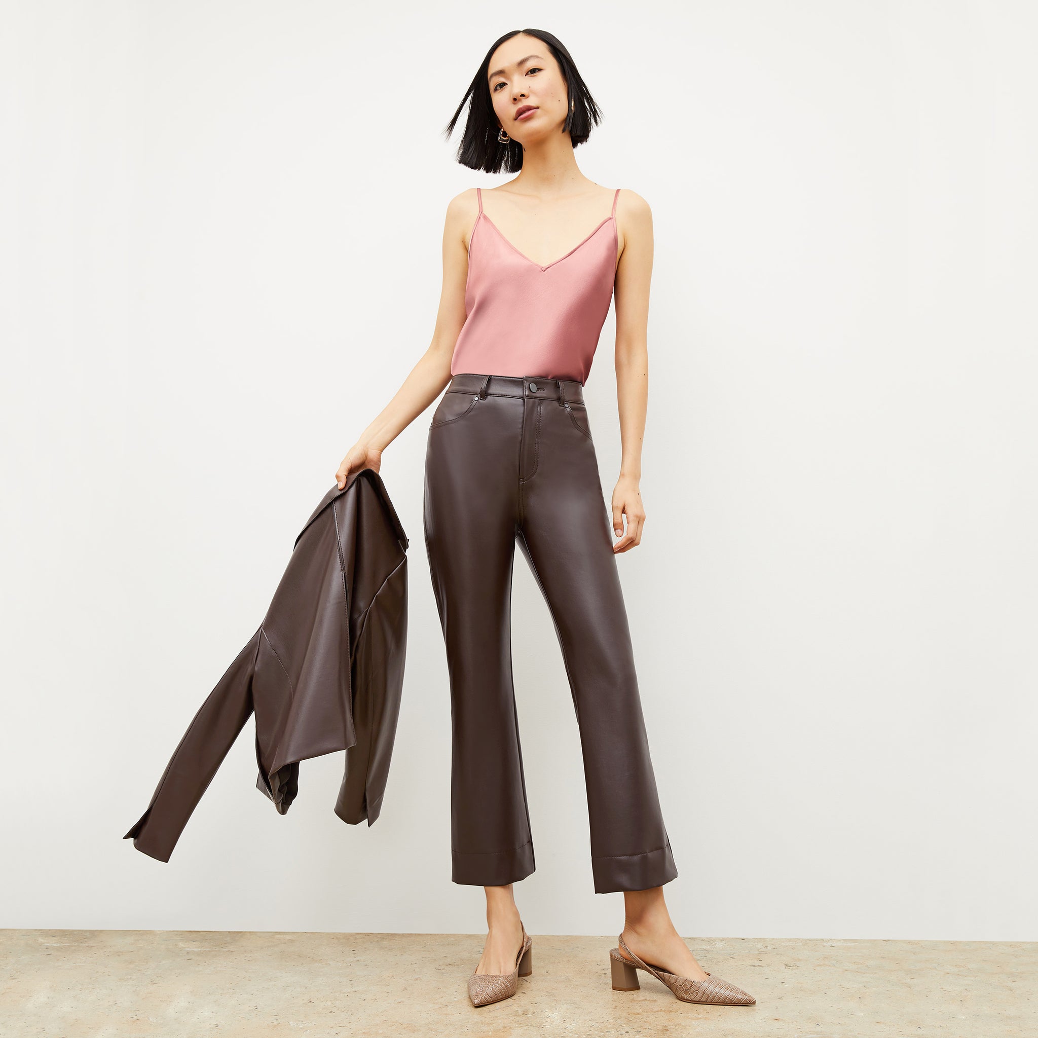 Front image of a woman wearing the archie pant in brown