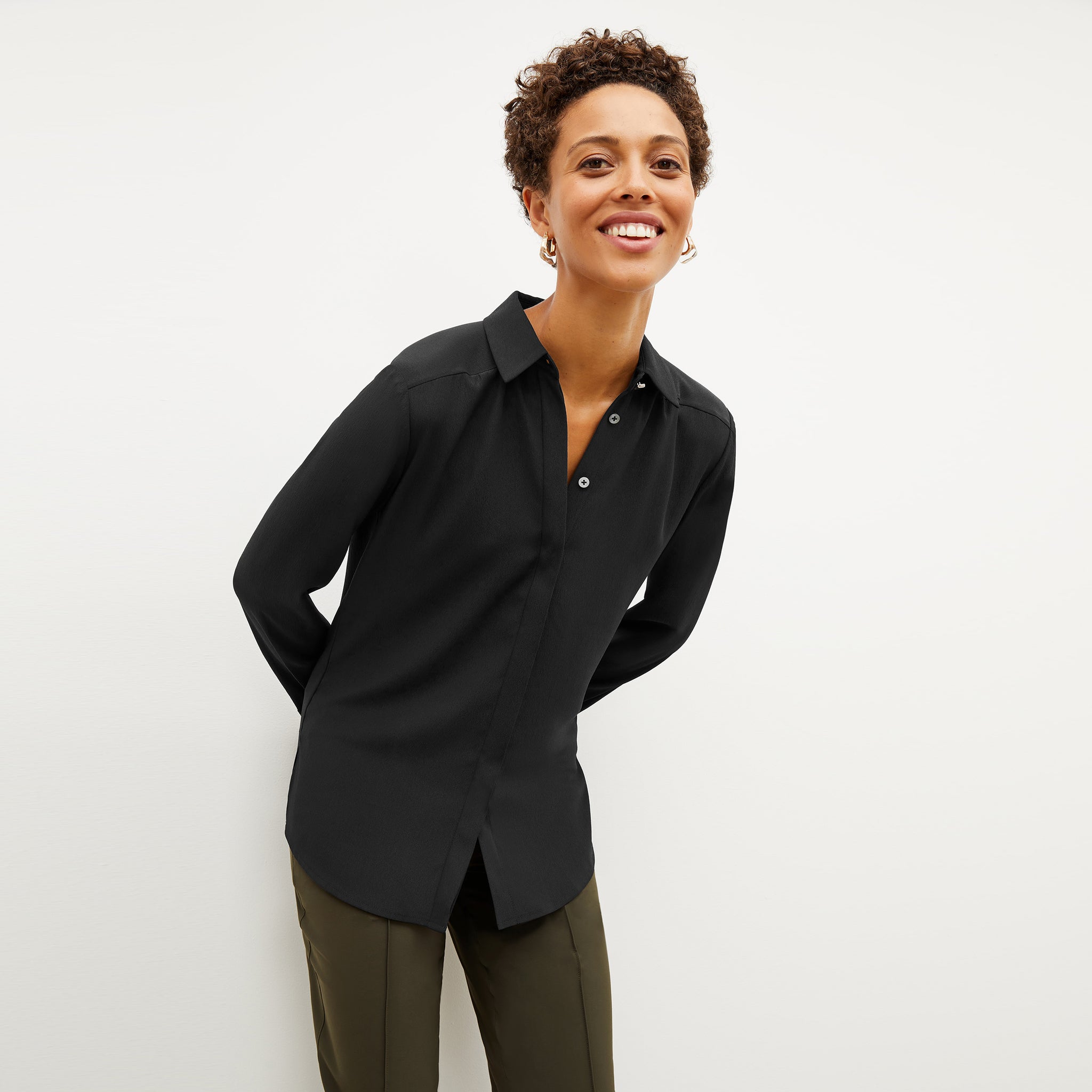 Front image of a woman wearing the lagarde shirt in black