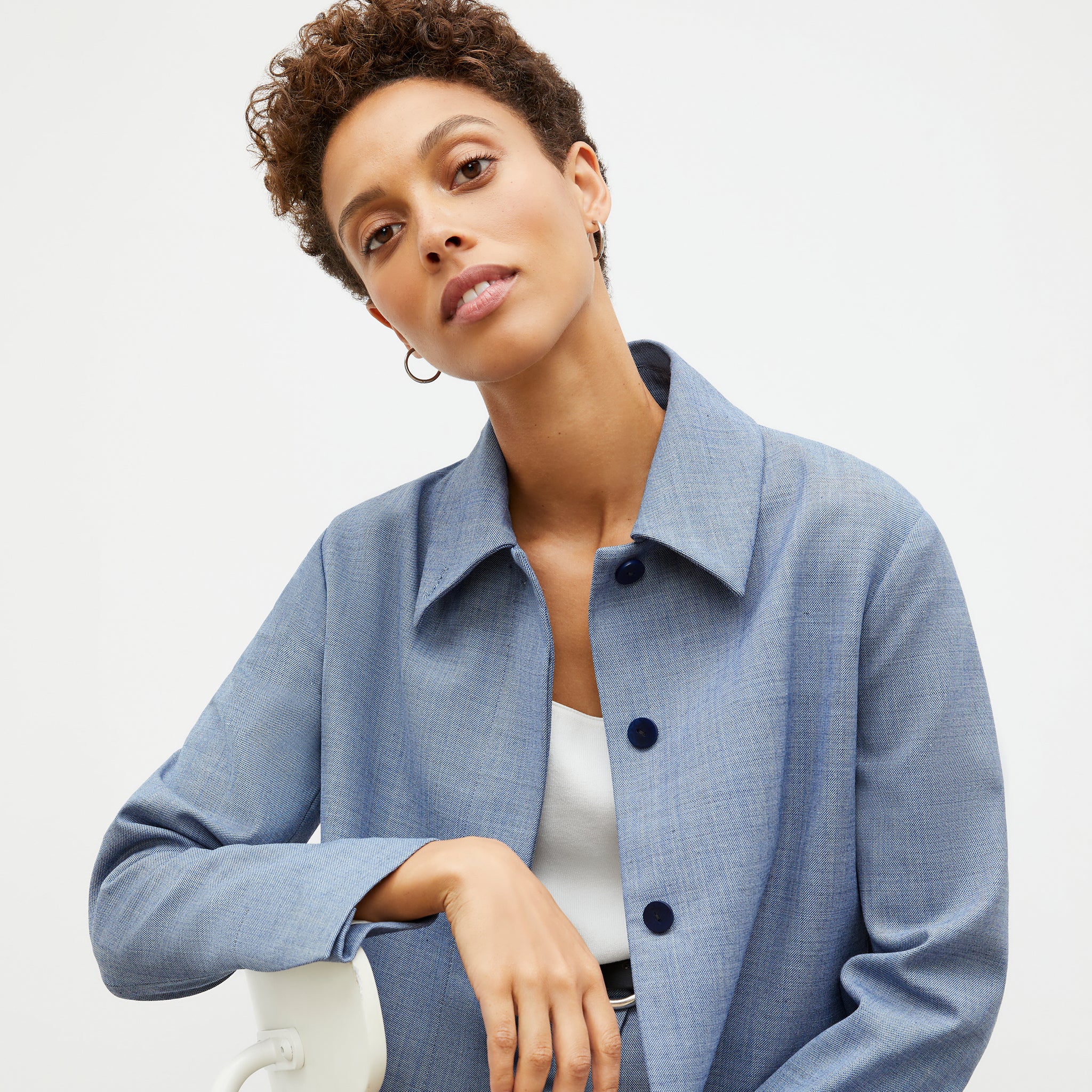 Front image of a woman wearing the nicky jacket in indigo and white 