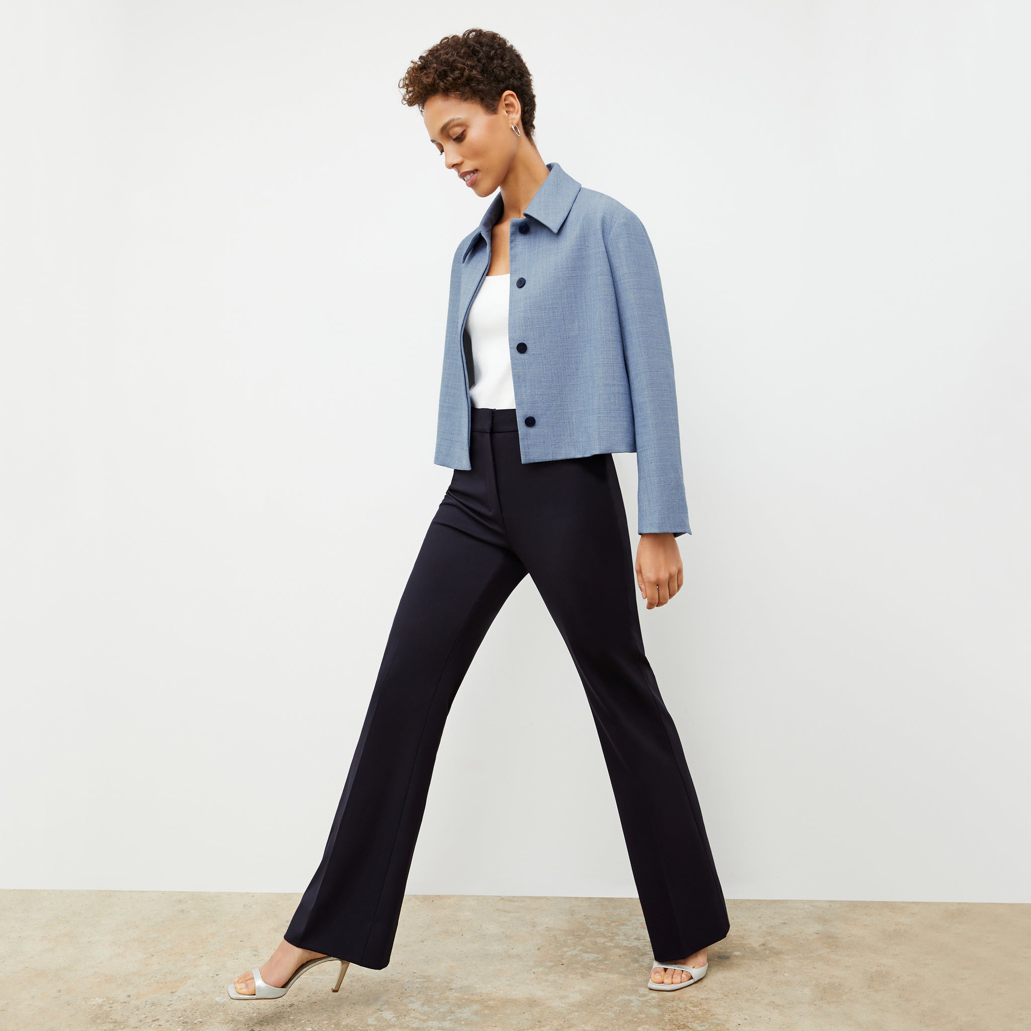 Side image of a woman wearing the Horton pant in Galaxy Blue