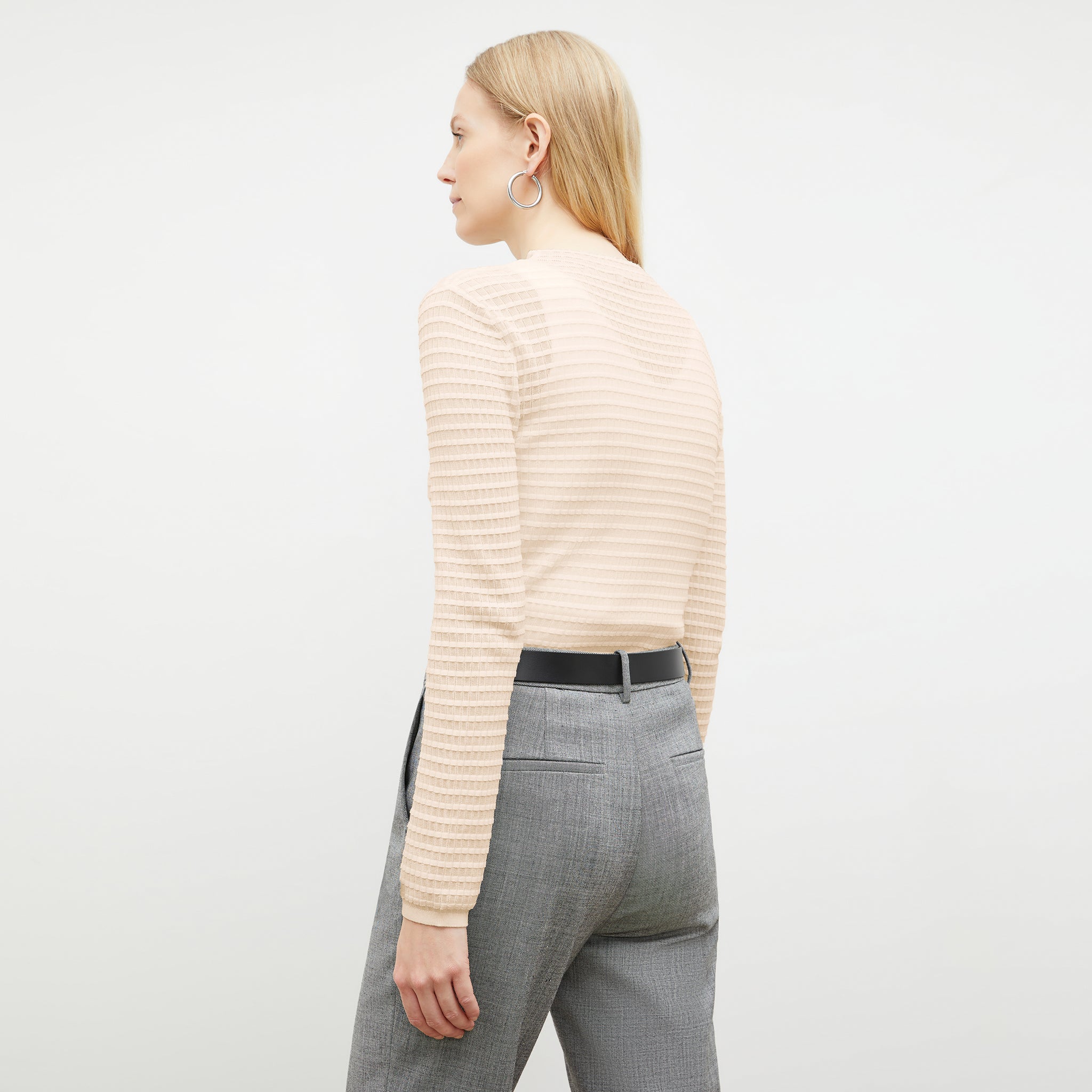 Front image of a woman wearing the Brodie Top in Meringue