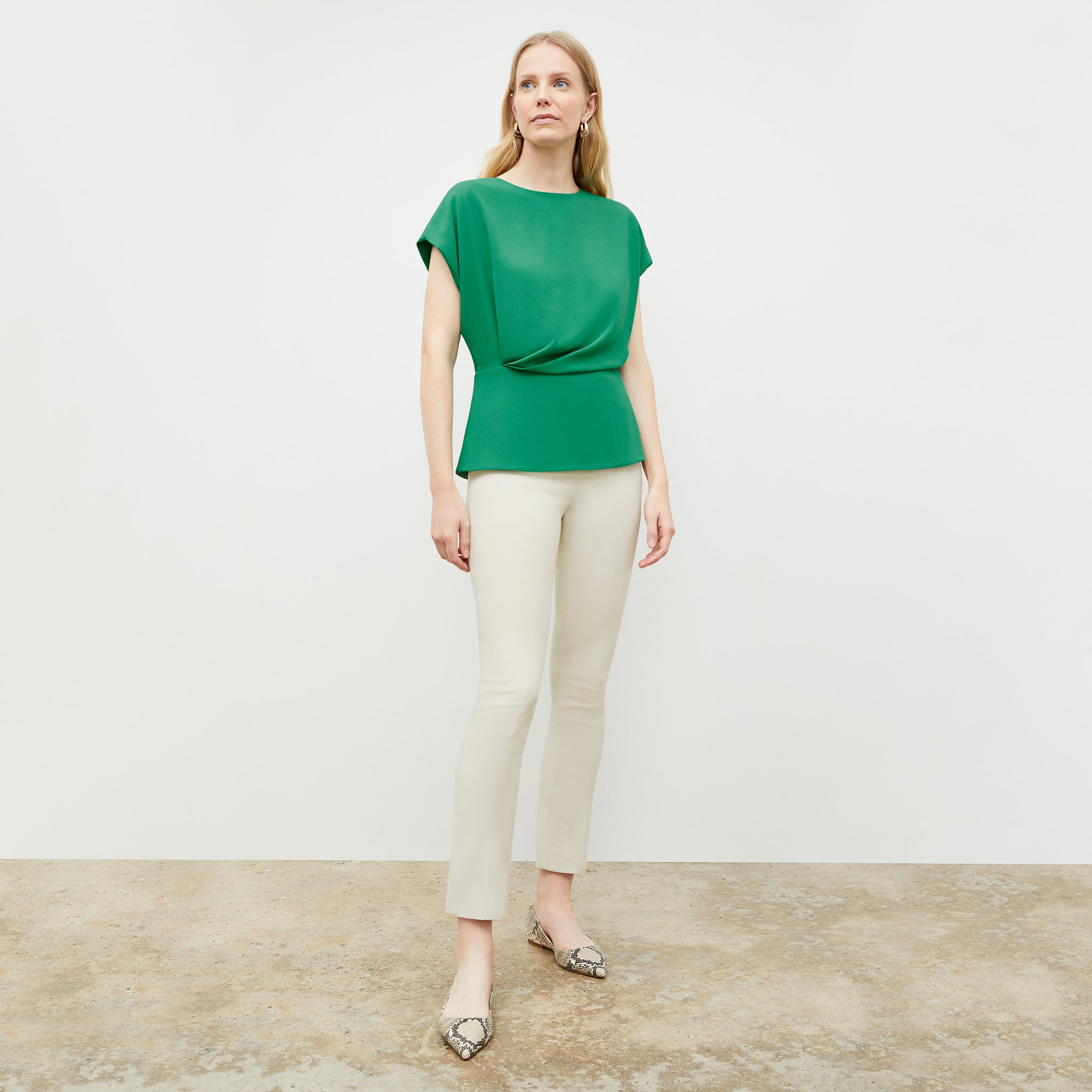 Front image of a woman in the nejvi top in clover 