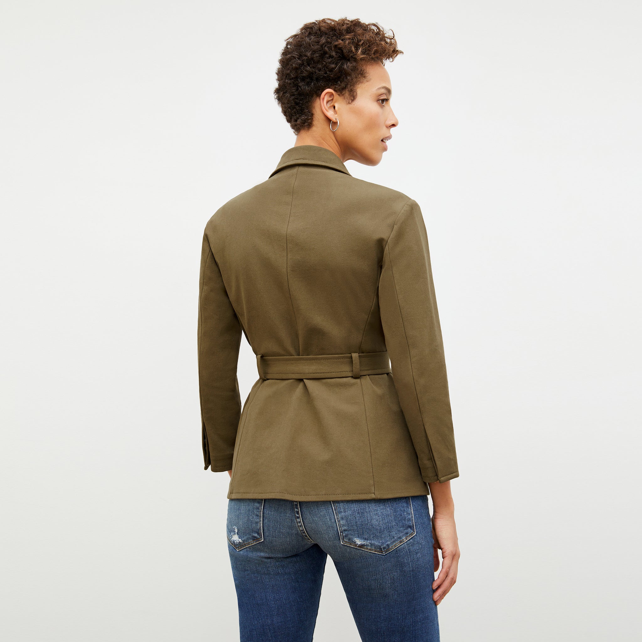 Back image of a woman in the emalis jacket in oregano