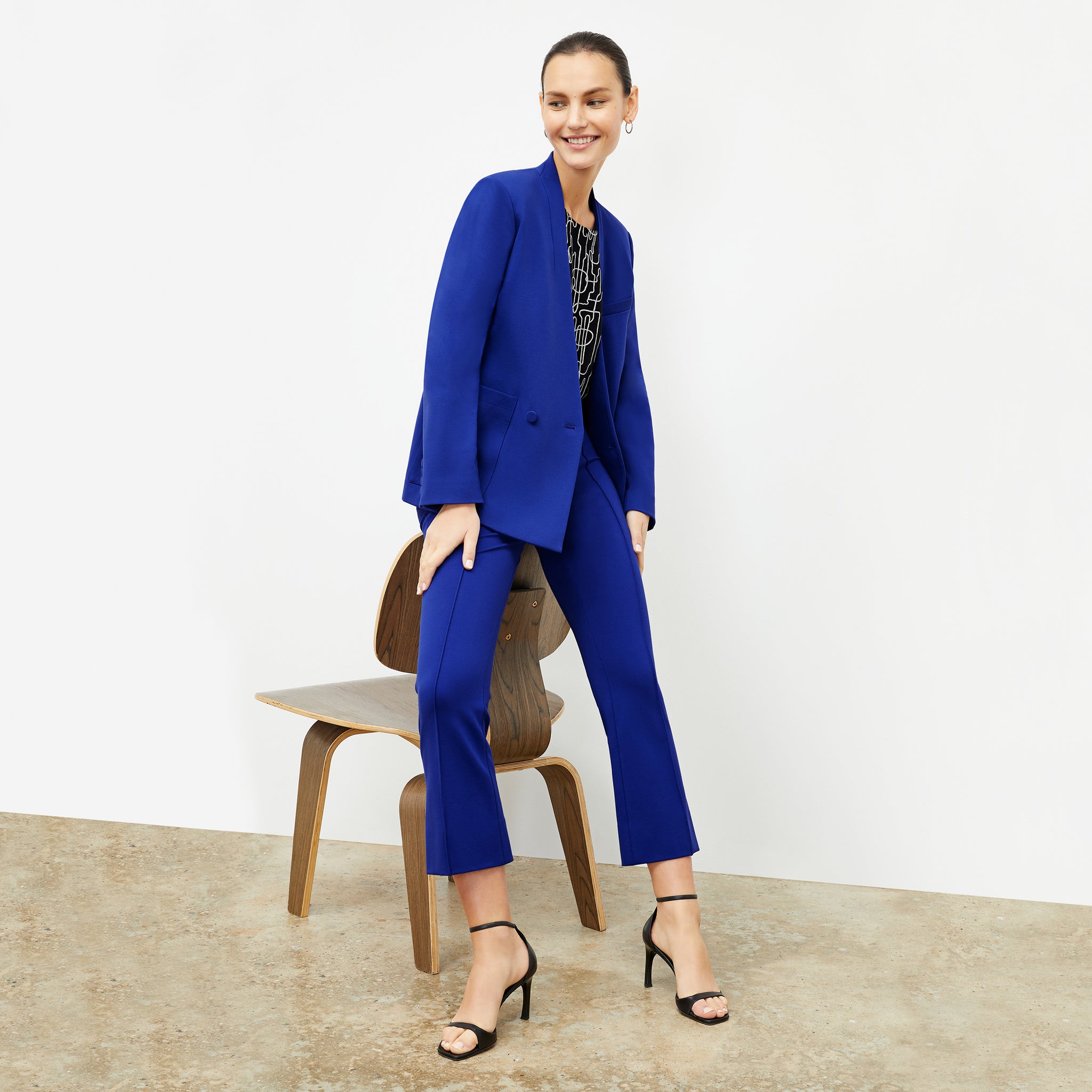 front image of a woman wearing the janette jacket in electric blue