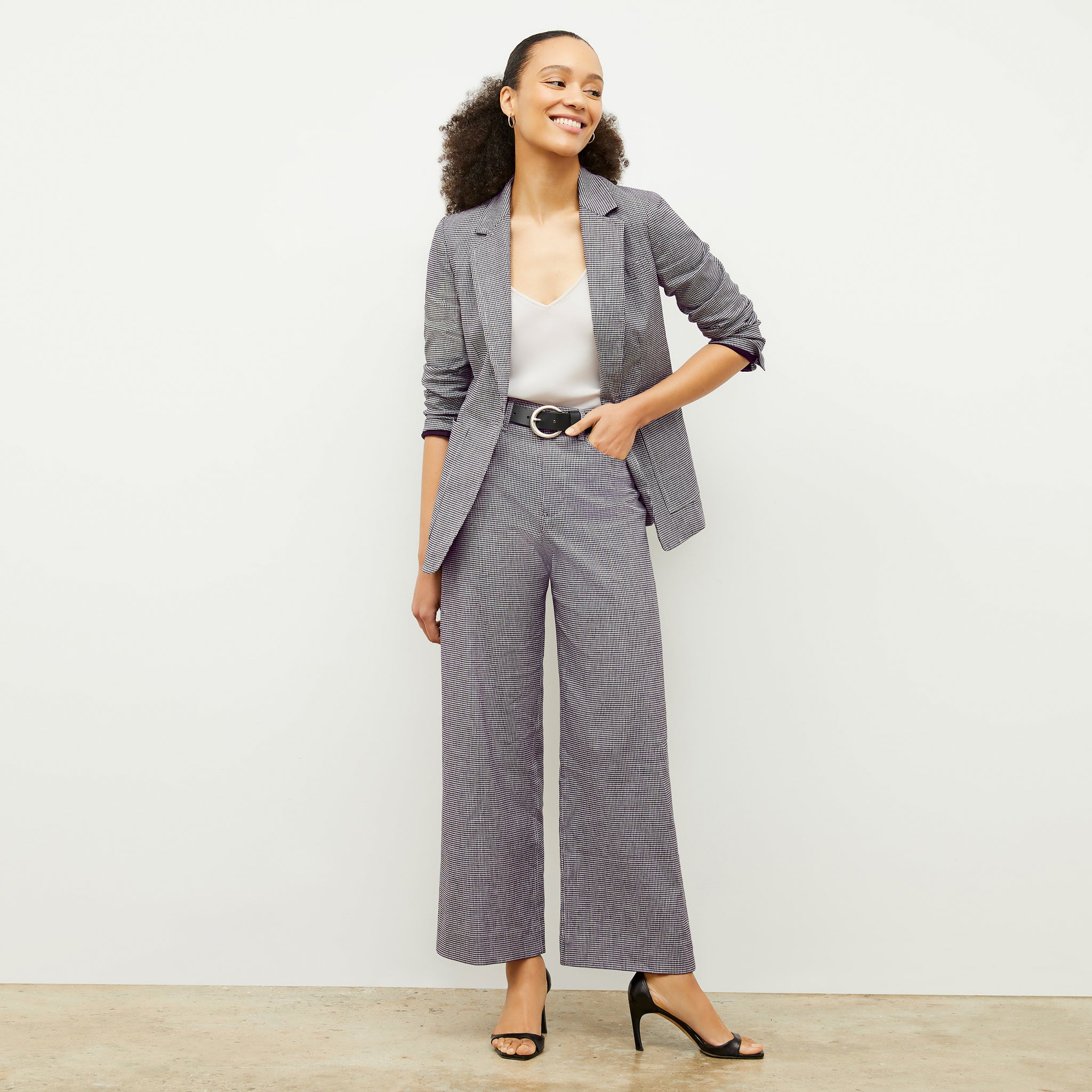 front image of a woman wearing the milo pant in gingham linen 