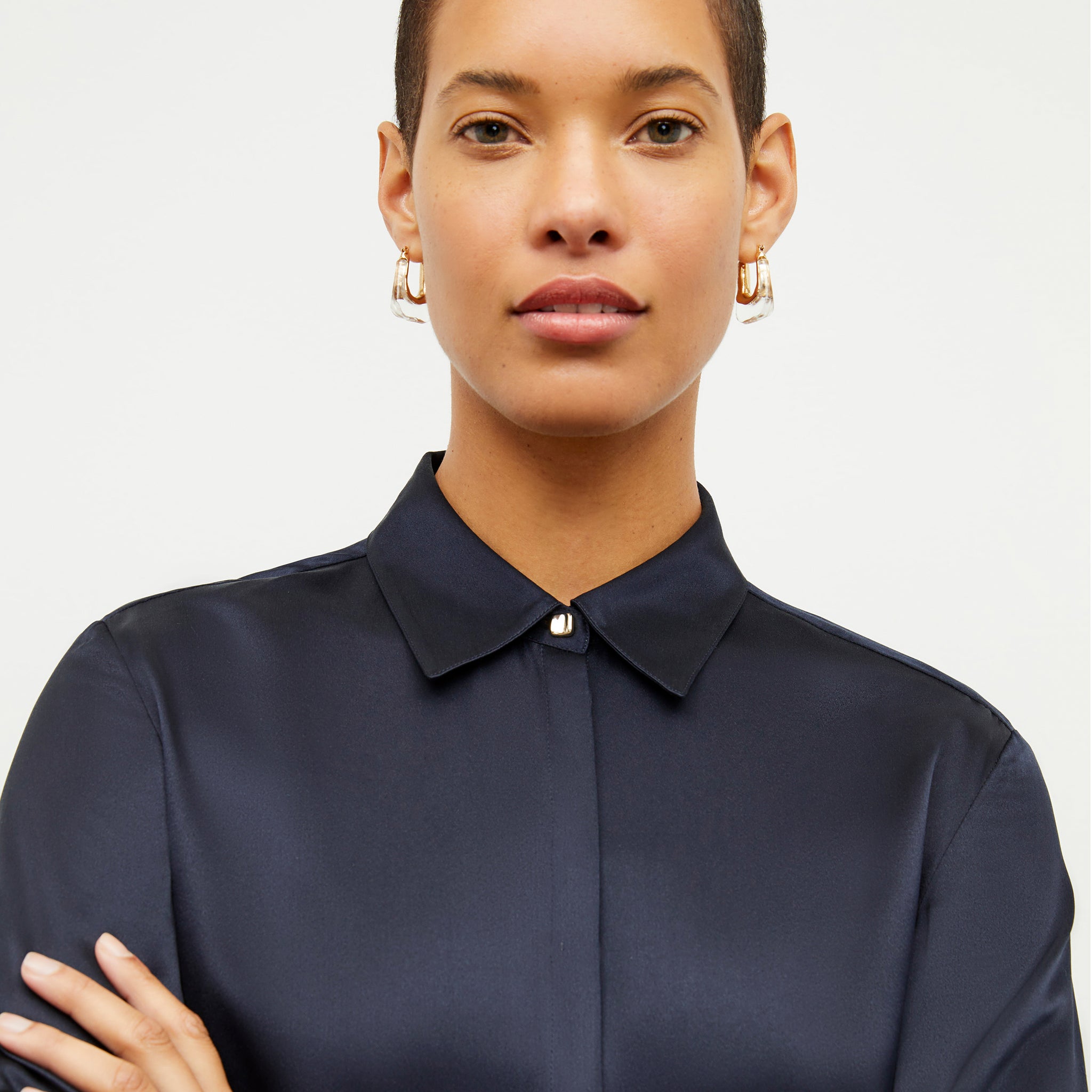Front image of a woman wearing the Tatum Top in Galaxy Blue 