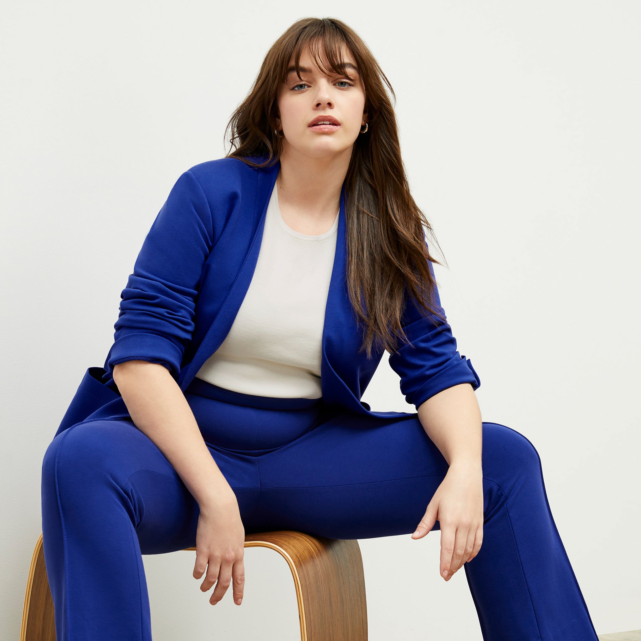 front image of a woman wearing the janette jacket in electric blue