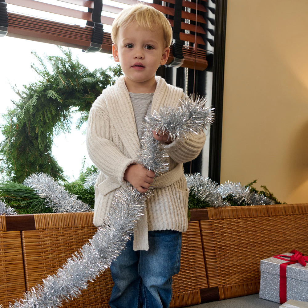 image of a little guy wearing the mini snyder in ivory