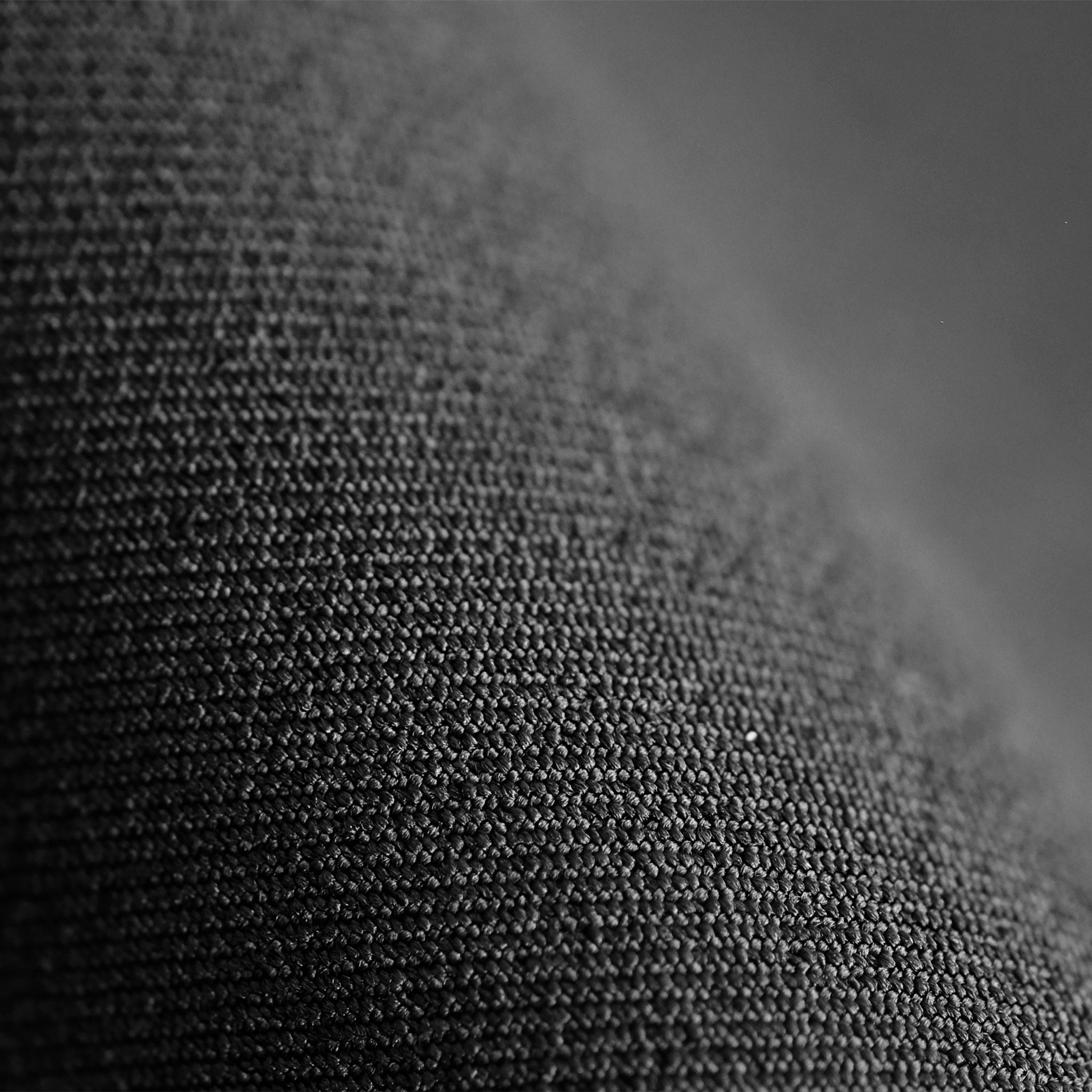 Close up image of powerstretch fabric in black