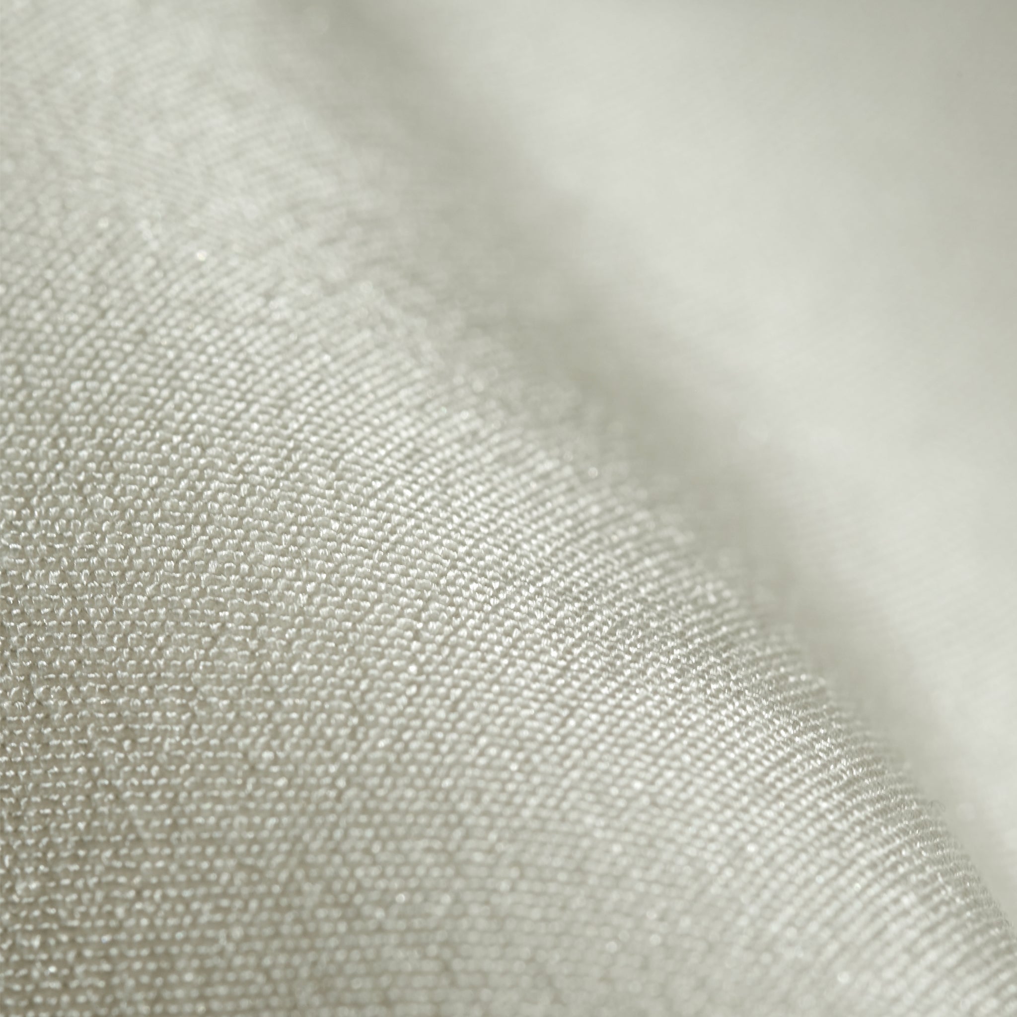 Close up image of washable silk fabric in ivory