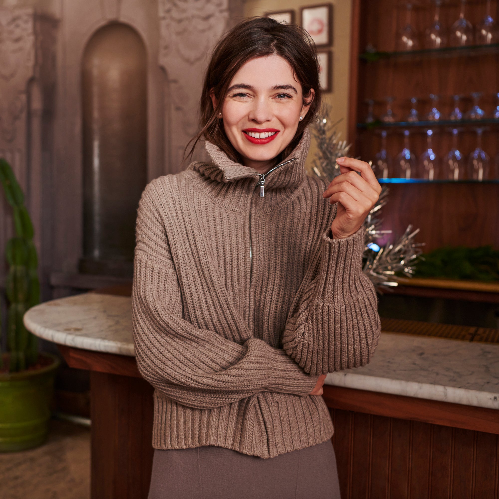 Front image of a woman wearing the william sweater in barley