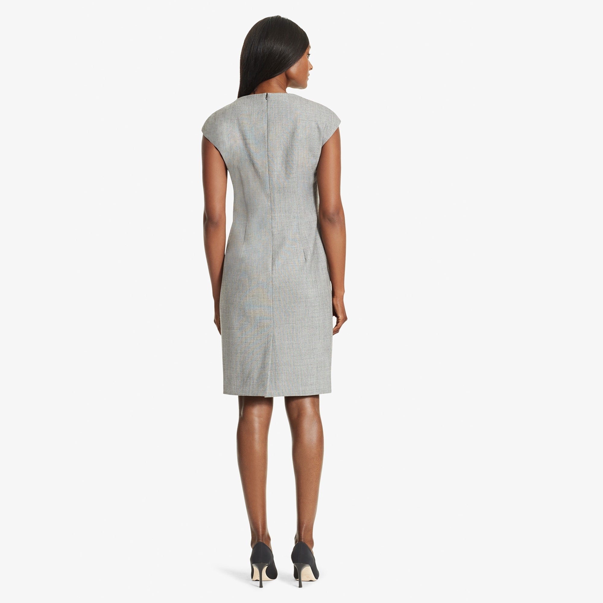 Back image of a woman standing wearing the Marilyn Dress Sharkskin in Black and White