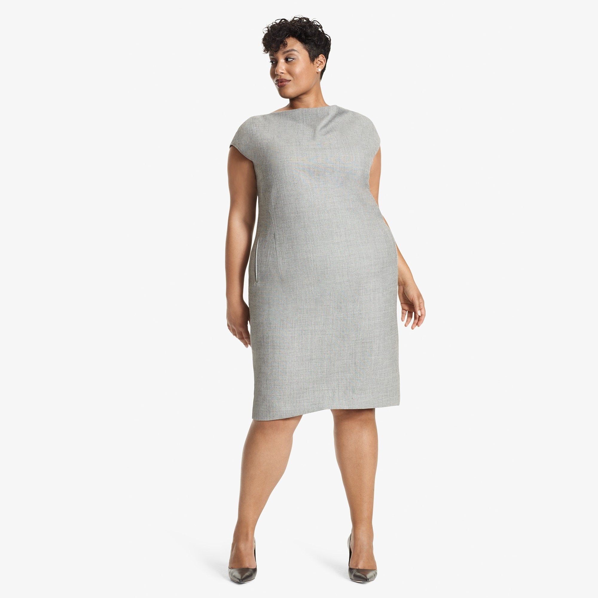 Front image of a woman standing wearing the Marilyn Dress Sharkskin in Black and White
