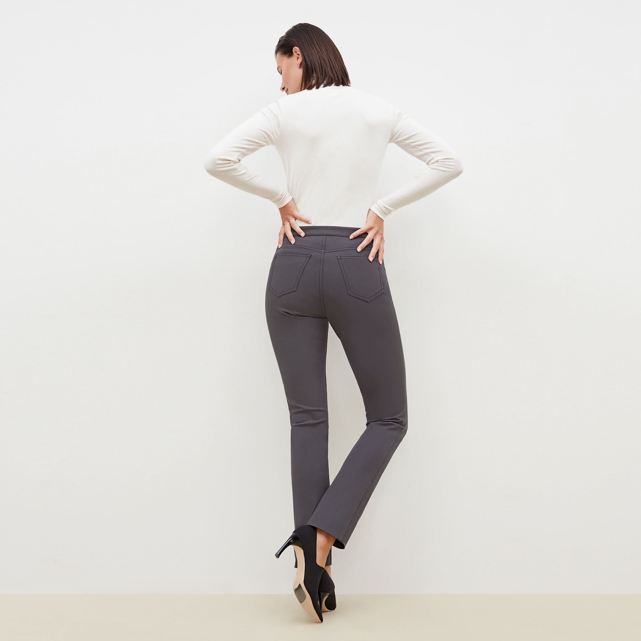Back image of a woman standing wearing the Hockley Jean—Better Than Denim in Cool Charcoal
