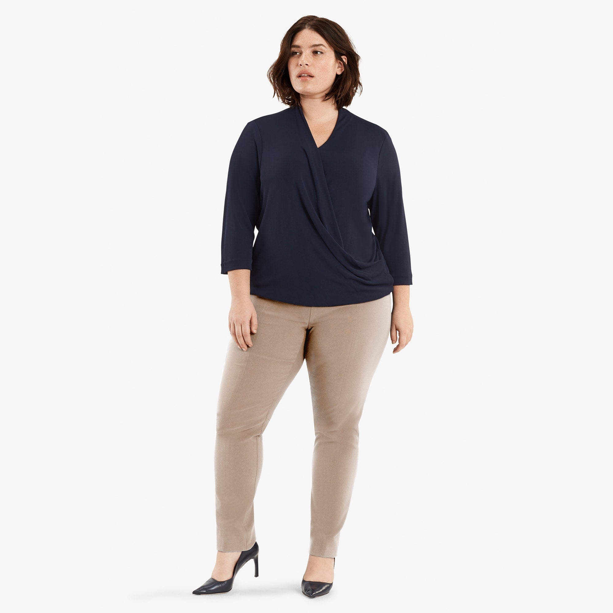 Front image of a woman standing wearing the Foster Pant in Russet
