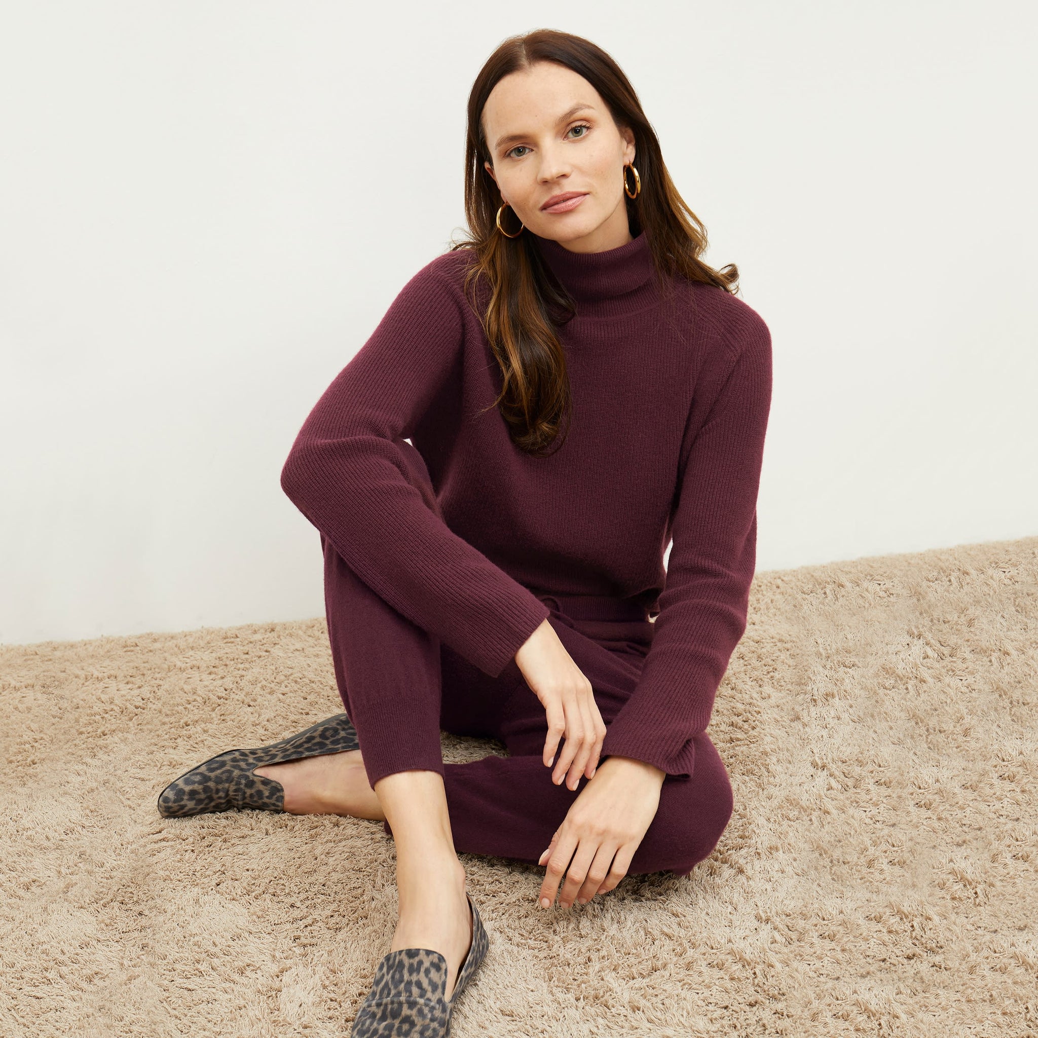Front image of a woman standing wearing the arbus in chiante