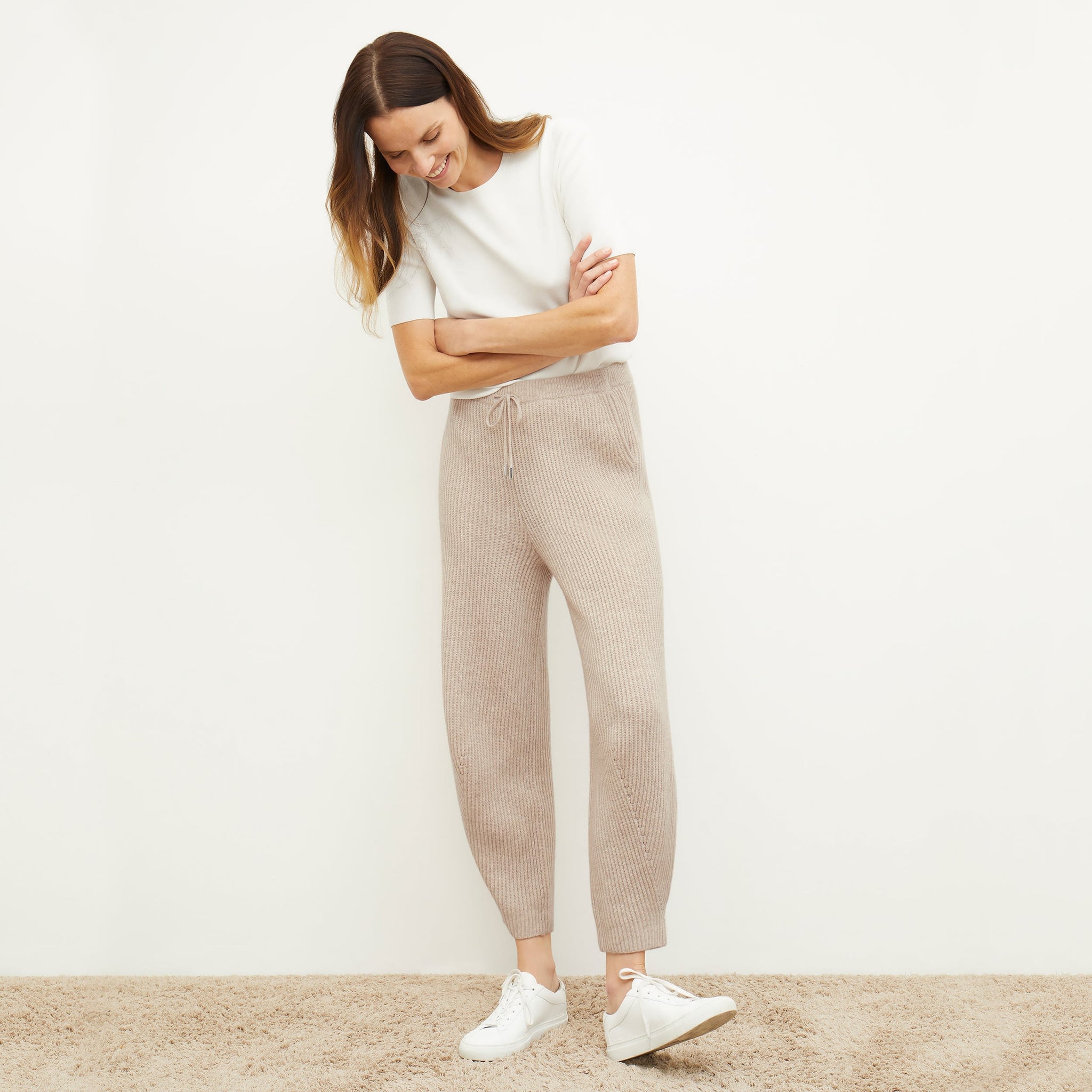 Front image of a woman standing wearing the Addison Jogger—Cashmere/Wool in Oatmeal Melange 